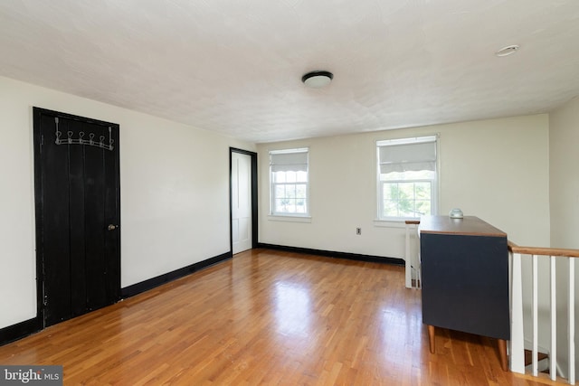 5378 Main St, Stephens City, VA 22655 - spare room featuring light wood-style floors and baseboards