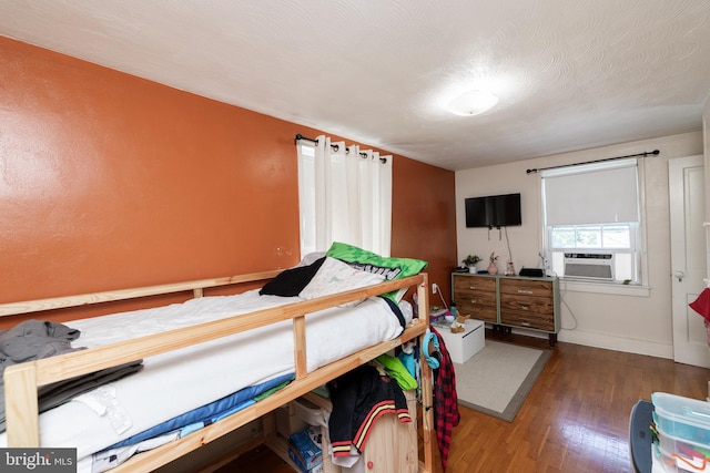 5378 Main St, Stephens City, VA 22655 - bedroom featuring cooling unit and wood finished floors