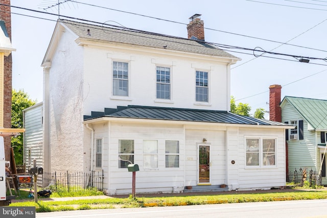 5378 Main St, Stephens City, VA 22655 - view of front facade with a standing seam roof, a chimney, and a metal roof