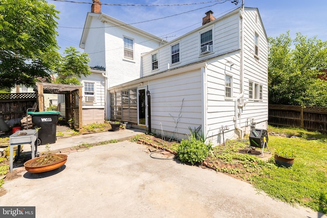 5378 Main St, Stephens City, VA 22655 - back of property featuring a patio and a chimney