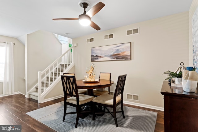 6111 Summit Pointe Dr, Harrisburg, PA 17111 - dining area featuring wood finished floors, ceiling fan, and stairs