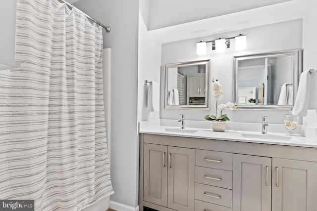 6111 Summit Pointe Dr, Harrisburg, PA 17111 - bathroom featuring double vanity and curtained shower