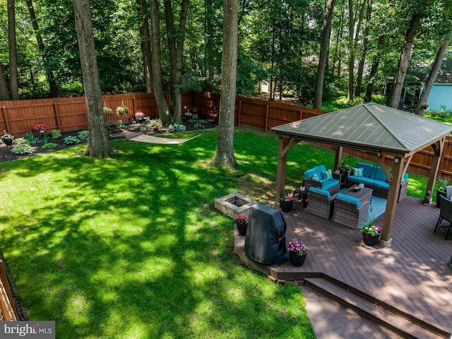 6111 Summit Pointe Dr, Harrisburg, PA 17111 - fenced backyard with an outdoor living space with a fire pit, a deck, and a gazebo
