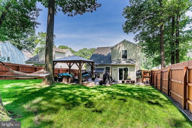 6111 Summit Pointe Dr, Harrisburg, PA 17111 - back of property featuring a gazebo, a fenced backyard, a patio, and a shingled roof