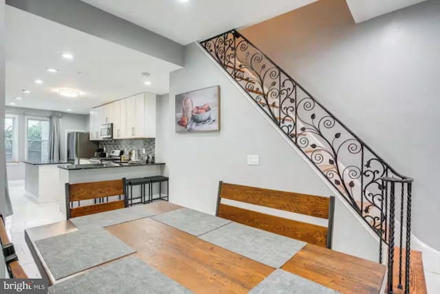 2057 N Franklin St, Philadelphia, PA 19122 - dining room with stairs and recessed lighting