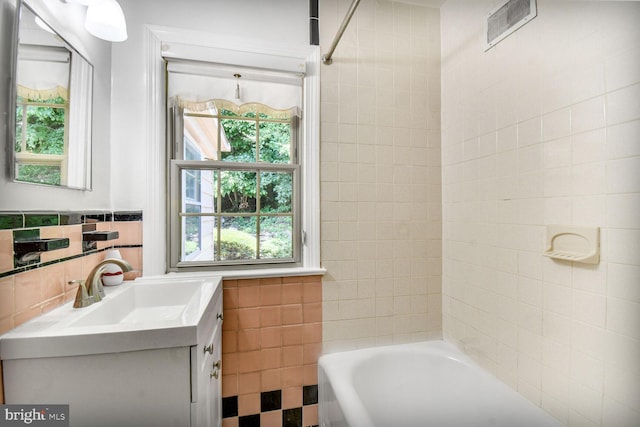 1627 Myrtle St NW, Washington, DC 20012 - full bathroom featuring tile walls and vanity