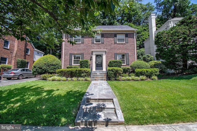 1627 Myrtle St NW, Washington, DC 20012 - colonial-style house featuring brick siding and a front yard