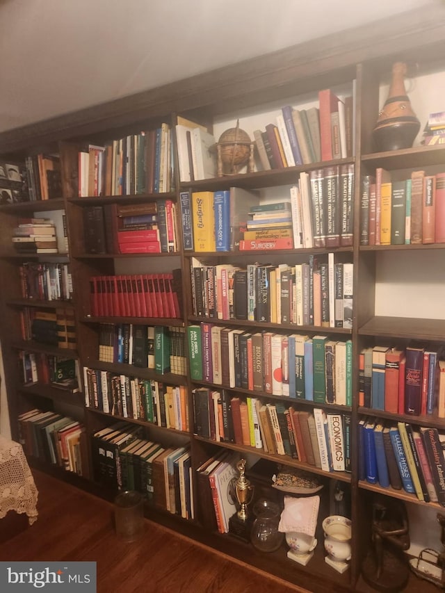 1627 Myrtle St NW, Washington, DC 20012 - sitting room with bookshelves and wood finished floors