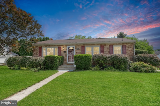 616 S 6th St, Lebanon, PA 17042 - view of front of home with a front yard and brick siding