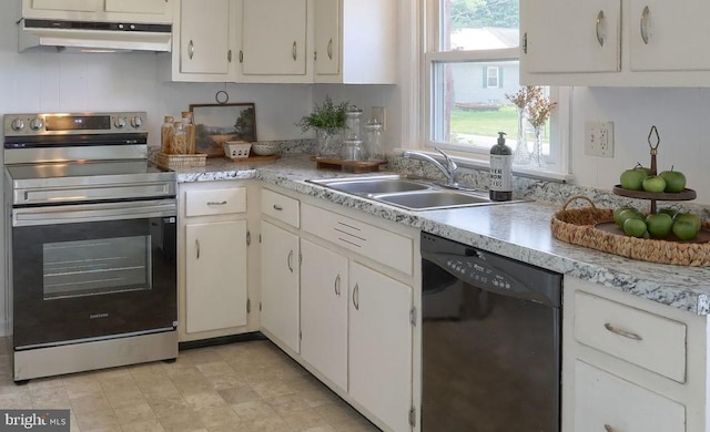 616 S 6th St, Lebanon, PA 17042 - kitchen featuring stainless steel range with electric cooktop, under cabinet range hood, black dishwasher, light countertops, and white cabinets