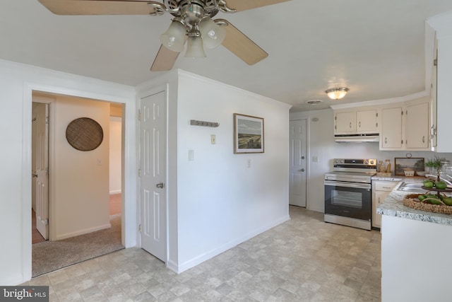 616 S 6th St, Lebanon, PA 17042 - kitchen featuring stainless steel range with electric cooktop, ceiling fan, under cabinet range hood, light countertops, and crown molding