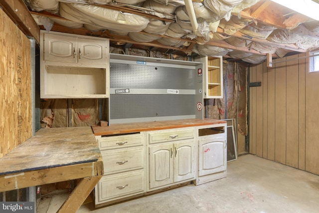 616 S 6th St, Lebanon, PA 17042 - unfinished basement with a workshop area and wooden walls