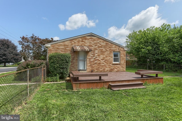616 S 6th St, Lebanon, PA 17042 - rear view of property featuring a deck and brick siding