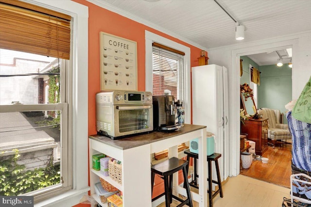 643 Penn, West Reading, PA 19611 - kitchen with rail lighting and wood finished floors