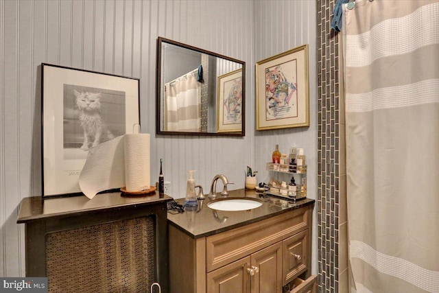 643 Penn, West Reading, PA 19611 - full bath with vanity, a shower with curtain, and wallpapered walls