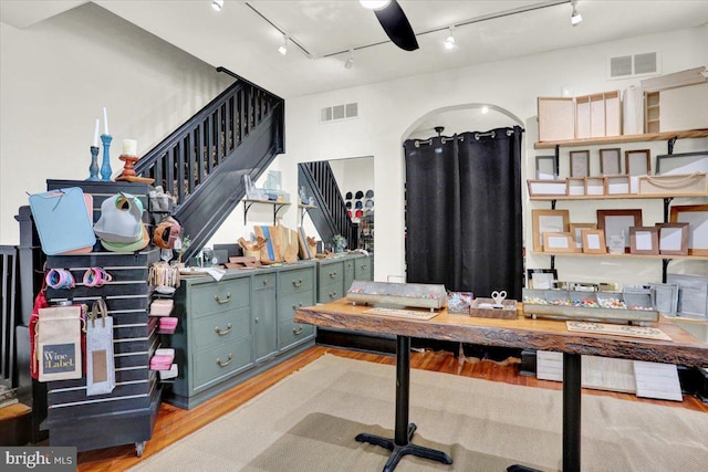 643 Penn, West Reading, PA 19611 - office space with track lighting, wood finished floors, and arched walkways