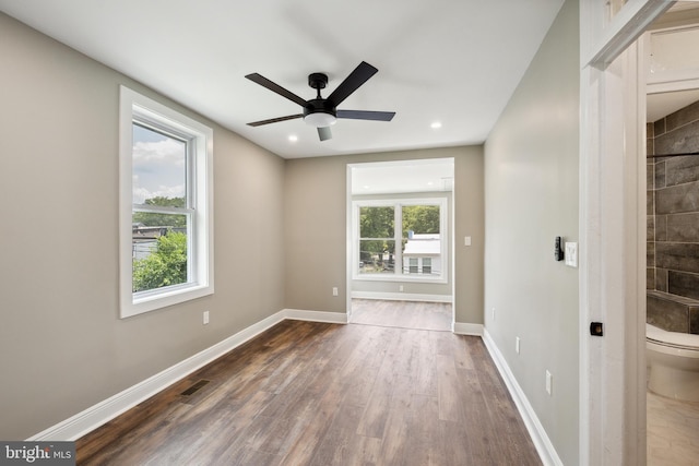 1233 Trinidad Ave NE, Washington, DC 20002 - empty room featuring dark wood-style flooring, ceiling fan, and recessed lighting