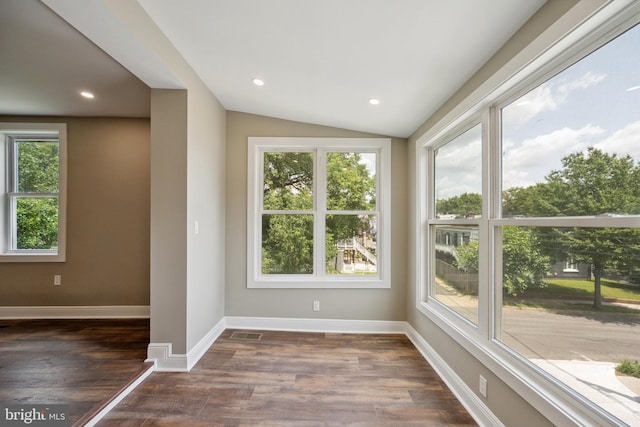1233 Trinidad Ave NE, Washington, DC 20002 - spare room with plenty of natural light, dark wood-style floors, vaulted ceiling, and recessed lighting