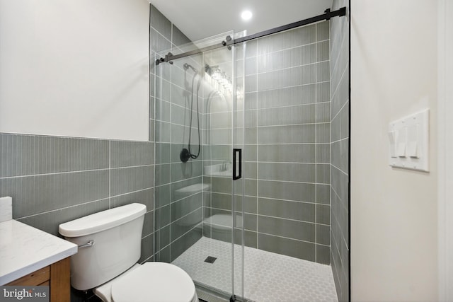 1233 Trinidad Ave NE, Washington, DC 20002 - bathroom featuring vanity, a shower stall, and tile walls