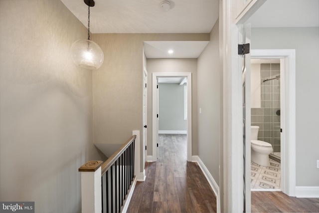 1233 Trinidad Ave NE, Washington, DC 20002 - hallway featuring wood finished floors and baseboards