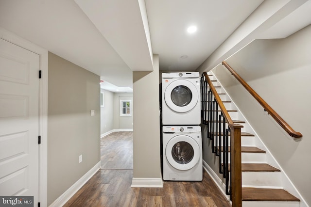1233 Trinidad Ave NE, Washington, DC 20002 - laundry room with stacked washer and clothes dryer and wood finished floors