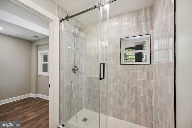 1233 Trinidad Ave NE, Washington, DC 20002 - bathroom with a shower stall and wood finished floors