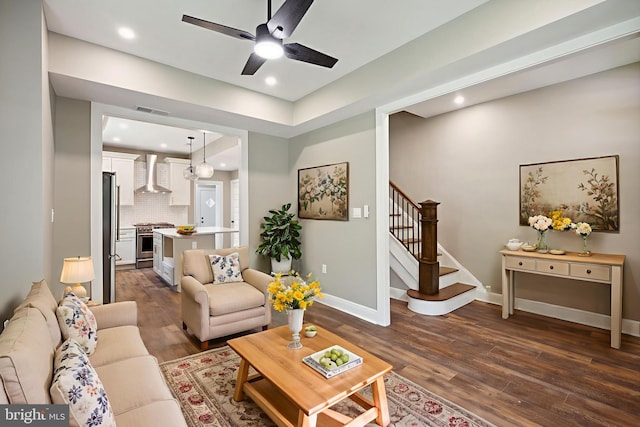 1233 Trinidad Ave NE, Washington, DC 20002 - living room featuring dark wood finished floors, recessed lighting, a ceiling fan, and stairway