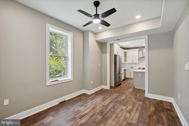 1233 Trinidad Ave NE, Washington, DC 20002 - unfurnished living room with dark wood-style floors, a ceiling fan, and recessed lighting