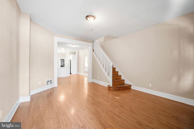 1713 S 58th St, Philadelphia, PA 19143 - foyer with light wood finished floors and stairway