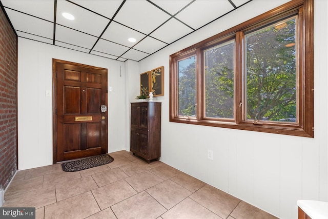 258 Pancoast Ave, Springfield, PA 19064 - foyer featuring light tile patterned flooring and brick wall