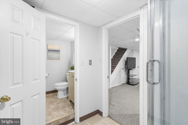 258 Pancoast Ave, Springfield, PA 19064 - bathroom featuring a paneled ceiling, vanity, and tile patterned floors