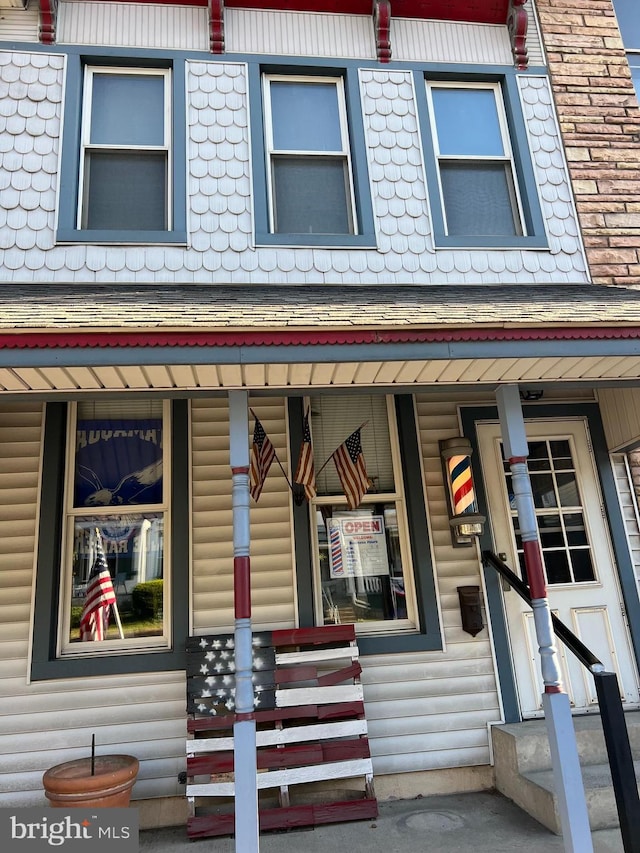 233 Broad St W, Tamaqua, PA 18252 - view of front of property featuring covered porch and a shingled roof