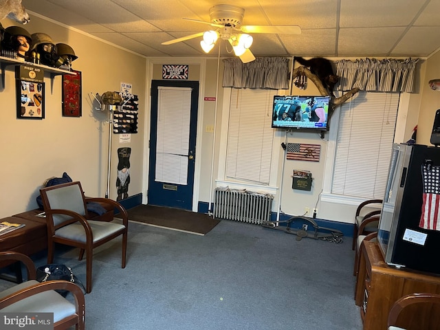 233 Broad St W, Tamaqua, PA 18252 - sitting room featuring radiator, carpet, a ceiling fan, and a paneled ceiling