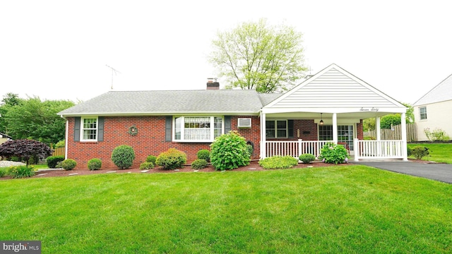 760 Sweetbriar Dr, Warminster, PA 18974 - ranch-style house featuring brick siding, covered porch, a chimney, and roof with shingles