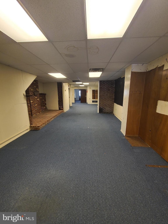 220 York Rd, Jenkintown, PA 19046 - finished below grade area with a drop ceiling, carpet floors, and a fireplace