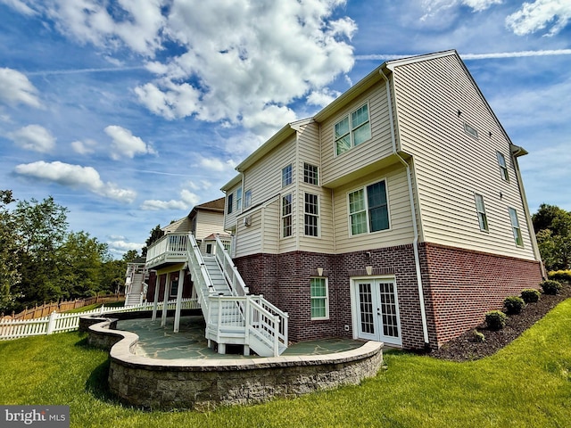 43616 Habitat Cir, Leesburg, VA 20176 - back of house with french doors, brick siding, stairs, and a patio