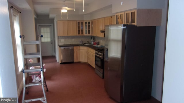 139 N 11th St, Allentown, PA 18102 - kitchen featuring stainless steel appliances, light brown cabinets, glass insert cabinets, tasteful backsplash, and a ceiling fan