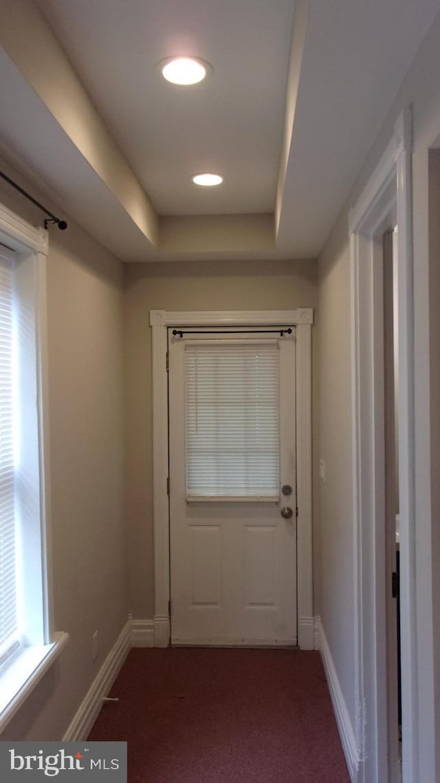 139 N 11th St, Allentown, PA 18102 - doorway to outside with carpet flooring and a raised ceiling