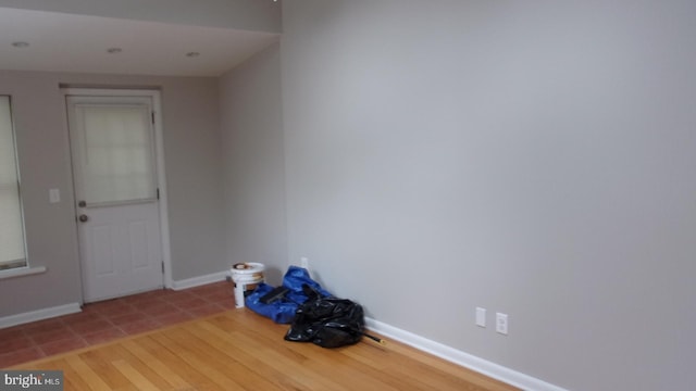 139 N 11th St, Allentown, PA 18102 - spare room with baseboards and wood finished floors