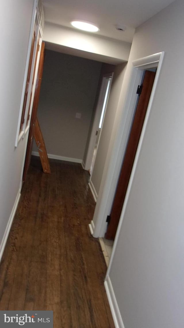 139 N 11th St, Allentown, PA 18102 - hallway with wood finished floors and baseboards