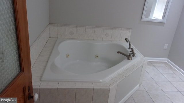 139 N 11th St, Allentown, PA 18102 - bathroom featuring a whirlpool tub and tile patterned floors