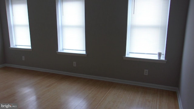 139 N 11th St, Allentown, PA 18102 - spare room featuring wood finished floors and healthy amount of natural light