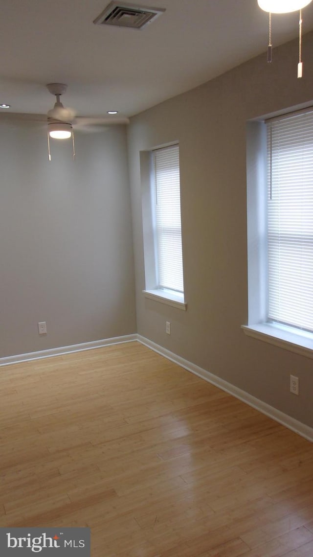 139 N 11th St, Allentown, PA 18102 - unfurnished room with healthy amount of natural light, light wood finished floors, and ceiling fan
