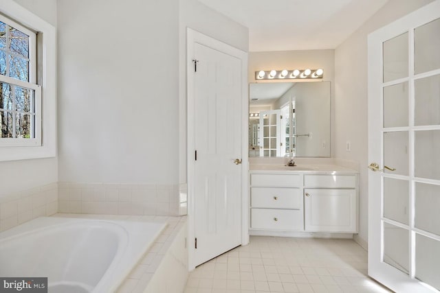 1050 Northfalls Ct, Great Falls, VA 22066 - full bath with a garden tub, vanity, and tile patterned floors