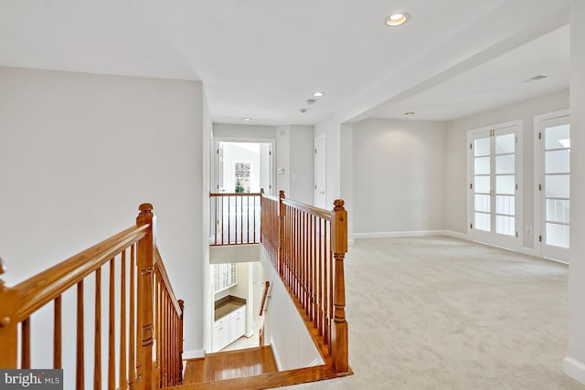 1050 Northfalls Ct, Great Falls, VA 22066 - hall featuring an upstairs landing, recessed lighting, carpet flooring, and plenty of natural light