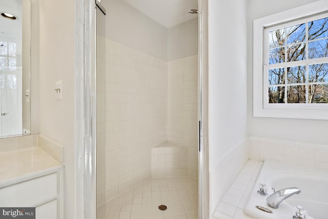1050 Northfalls Ct, Great Falls, VA 22066 - bathroom with a garden tub, a shower stall, and vanity