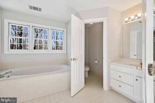1050 Northfalls Ct, Great Falls, VA 22066 - full bath featuring a garden tub, vanity, and tile patterned flooring