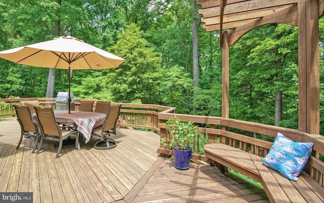 1050 Northfalls Ct, Great Falls, VA 22066 - deck with outdoor dining space, area for grilling, and a wooded view