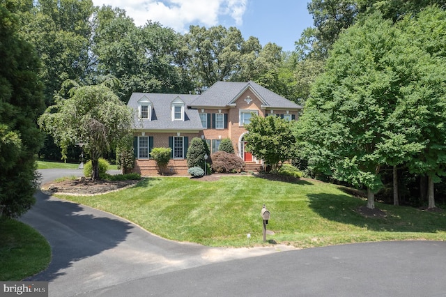 1050 Northfalls Ct, Great Falls, VA 22066 - view of front facade featuring brick siding and a front lawn