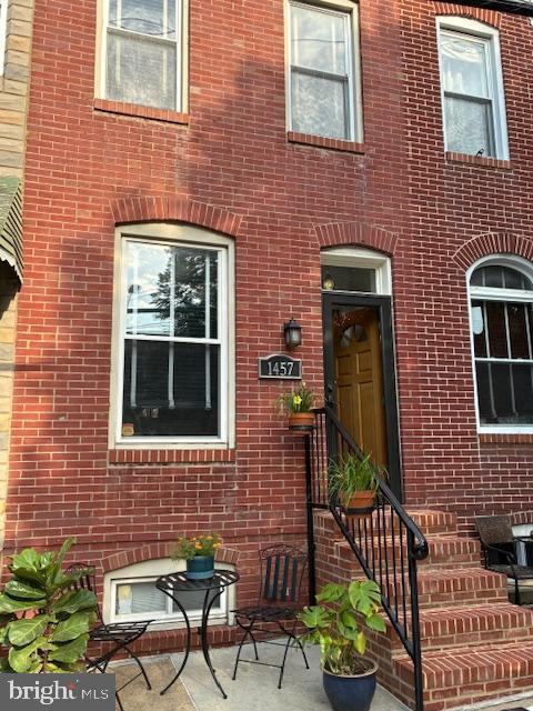 1457 Woodall St, Baltimore, MD 21230 - view of exterior entry with brick siding